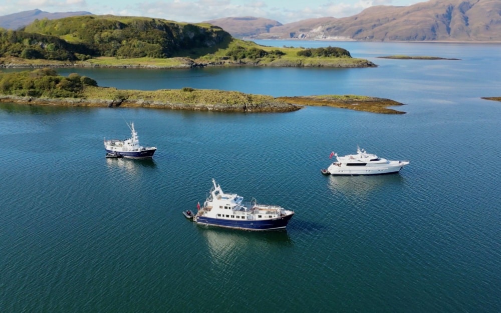 Hebrides cruise fleet of three ships off the Isle of Mull